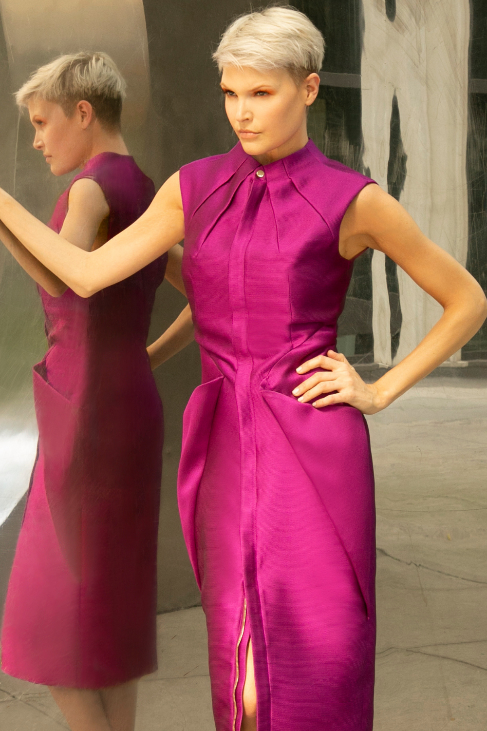Rasberry purple sleeveless midi cocktail party dress with two-way gold zipper and adjustable front slit. The dress has a straight fit with a round high neck and side pockets